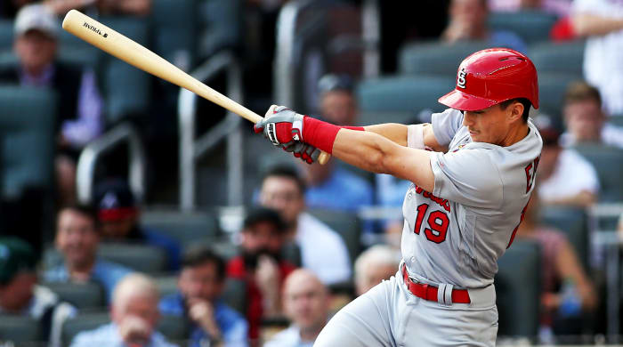 Oct 9, 2019; Atlanta, GA, USA;St. Louis Cardinals right fielder Tommy Edman (19) hits an RBI double against the Atlanta Braves in the first inning of game five of the 2019 NLDS playoff baseball series at SunTrust Park. Mandatory Credit: Brett Davis-USA TODAY Sports